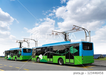 Electric buses at a bus station. Solar panels in the background Electric buses at a bus station. Solar panels in the background 123446458