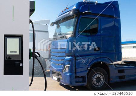 Electric vehicles charging station on a background of a truck. Concept. Electric vehicles charging station on a background of a truck. Concept. 123446516