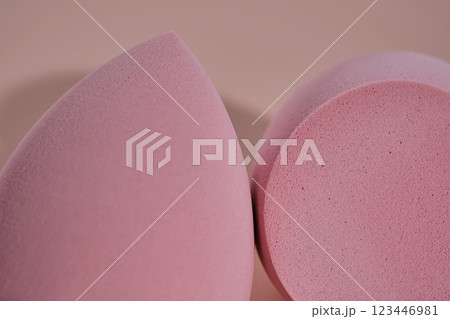 The texture of makeup sponges on a pink background. 123446981