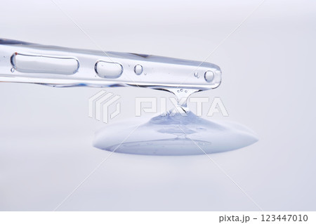 Pipette with delicate blue serum close-up. Pipette with delicate blue serum close-up. 123447010