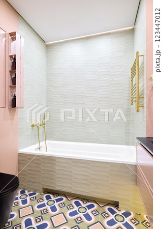 An Elegant Bathroom featuring a Modern Design complemented by Vibrant Colorful Tiles 123447012