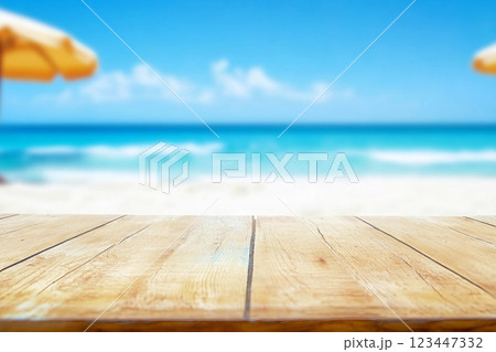 Wood table top on blurred blue sea and white sand beach background can be used for display or montage your products 123447332