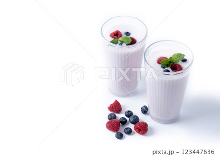 Fresh raspberry and blueberry smoothie isolated on white background 123447636
