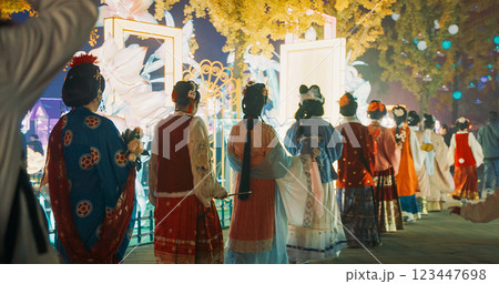 Beijing, China. Pretty Women In Traditional Chinese Dresses Visit Zigong Lantern Festival In Beijing. National Color. Asian Culture. Lantern Festival In Beijing Garden Expo Park. National Intangible Beijing, China. Pretty Women In Traditional Chinese Dresses Visit Zigong Lantern Festival In Beijing. National Color. Asian Culture. Lantern Festival In Beijing Garden Expo Park. National Intangible 123447698