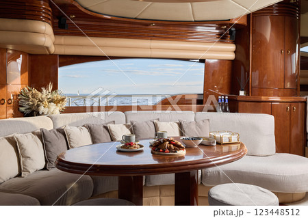 The exquisite interior design of a luxury yacht provides a breathtaking scenic view that captivates The exquisite interior design of a luxury yacht provides a breathtaking scenic view that captivates 123448512