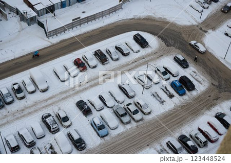 Aerial View of a Beautifully SnowCovered Parking Lot During the Cold Winter Season 123448524