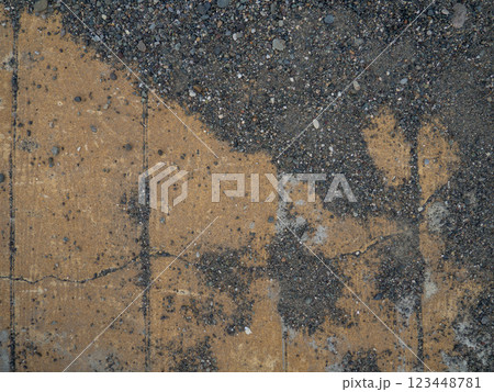 Background of brown tiles and small pebbles. Solid material pattern. Pebbles on tiles. Sidewalk surface in the park. Near the sea coast Background of brown tiles and small pebbles. Solid material pattern. Pebbles on tiles. Sidewalk surface in the park. Near the sea coast 123448781
