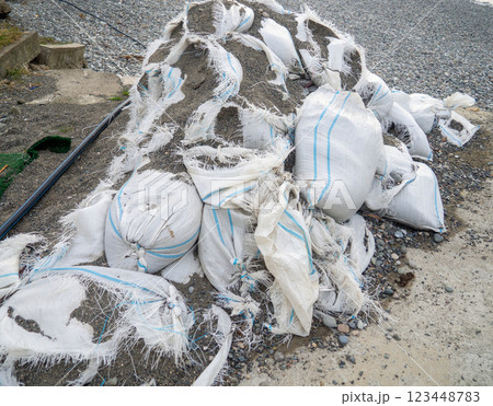 Old bags of cement. White bags with building material. 123448783