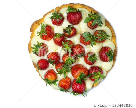 Cake topped with fresh strawberries. Creamy shortbread cake on a white background. Tasty food. Caloric nutrition. Handmade dessert isolate Cake topped with fresh strawberries. Creamy shortbread cake on a white background. Tasty food. Caloric nutrition. Handmade dessert isolate 123448836