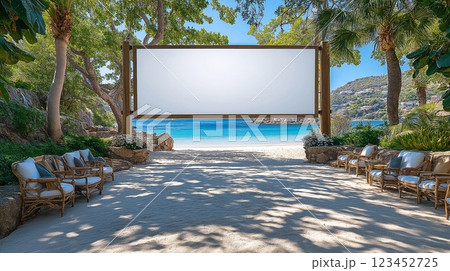 Outdoor movie screening setup at beachside location during sunny day 123452725