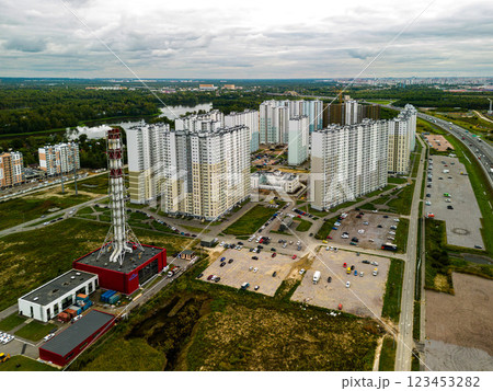Aerial View of an Urban Residential Complex Featuring a Central Heating Station Facility 123453282