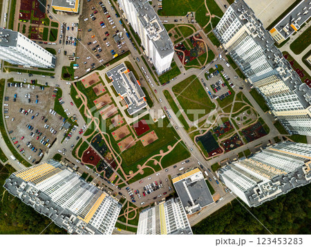 Aerial view of a modern urban housing complex with beautifully designed green spaces Aerial view of a modern urban housing complex with beautifully designed green spaces 123453283