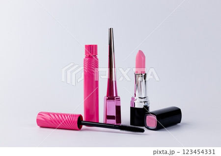 A Stunning Collection of Pink Cosmetic Items Showcasing Lipstick, Eyeliner, and Mascara in a Stylish Display for Beauty Enthusiasts and Makeup Lovers A Stunning Collection of Pink Cosmetic Items Showcasing Lipstick, Eyeliner, and Mascara in a Stylish Display for Beauty Enthusiasts and Makeup Lovers 123454331