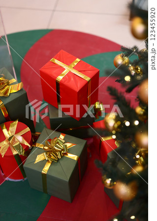 Delightful and Festive Christmas Gifts Placed Under the Beautiful Tree This Holiday Season Delightful and Festive Christmas Gifts Placed Under the Beautiful Tree This Holiday Season 123455920