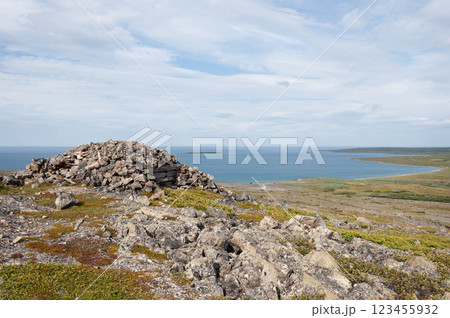 Old abandoned stone pillbox at seashore Old abandoned stone pillbox at seashore 123455932