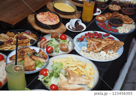 A Delicious and Colorful Spread of Various Delectable Dishes Decoratively Arranged on a Table 123456305