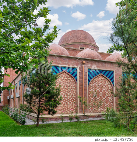 Beautifully Crafted Traditional Brick Wall With Geometric Patterns and Vibrant Tiles in a Serene Garden Beautifully Crafted Traditional Brick Wall With Geometric Patterns and Vibrant Tiles in a Serene Garden 123457756