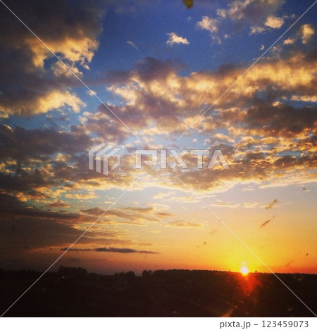 Sunset, Sky clouds over sea in the Evening with Orange 123459073