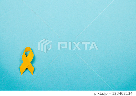 Yellow ribbon symbolizes hope and support in the fight against cancer Yellow ribbon symbolizes hope and support in the fight against cancer 123462134