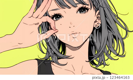 OKサインを出している若い女性