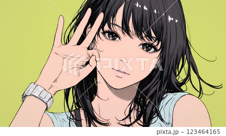 OKサインを出している若い女性