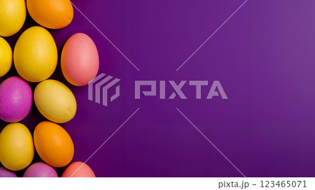 A bunch of colorful easter eggs on a purple background 123465071