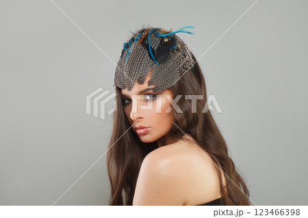 Perfect female model with healthy long wavy hairstyle, trendy make-up  123466398