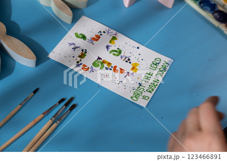 Drawing Easter cross Storytelling of creating craft Easter greeting card holiday present. Tactile hand-on activity. Master class progress of creative me-made gifts. Seasonal domestic life micro moment 123466891