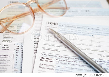 Tax form 1040 U.S. Individual Income Tax Return, business finance. 123469428