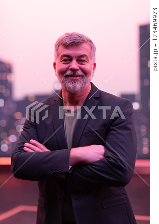Confident Senior Gentleman with a Smile in an Urban Cityscape. 123469973
