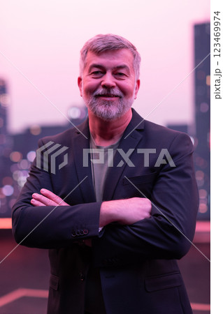 Confident Senior Gentleman with a Smile in an Urban Cityscape. 123469974