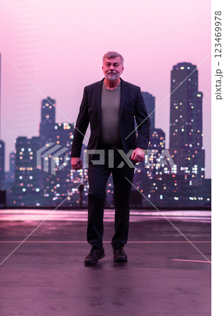 Confident Gentleman Walking in an Urban Evening Cityscape. 123469978