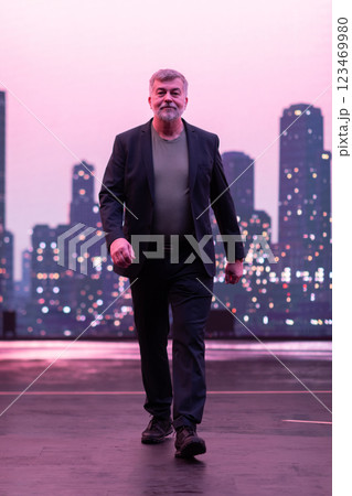 Confident Gentleman Walking in an Urban Evening Cityscape. 123469980