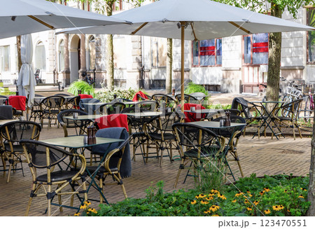 street cafe with empty tables on a summer day. 123470551