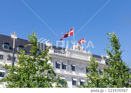 Hotel D'Angleterre in Copenhagen with Danish flags. 123470567