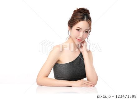 Beautiful young asian woman with clean fresh skin on white background, Face care, Facial treatment, Cosmetology, beauty and spa, Asian women portrait. Beautiful young asian woman with clean fresh skin on white background, Face care, Facial treatment, Cosmetology, beauty and spa, Asian women portrait. 123471599