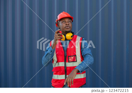 Foreman or worker work at Container cargo site check up goods in container. 123472215