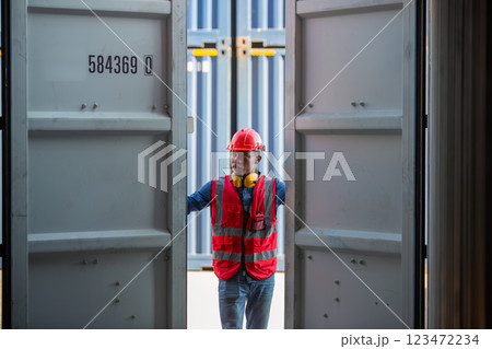 Foreman or worker work at Container cargo site check up goods in container. 123472234