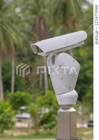 Online Security CCTV camera surveillance system outdoor of house.	 123473846