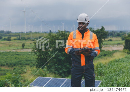 Engineer Checking solar panels in agriculture farm land. 123474475