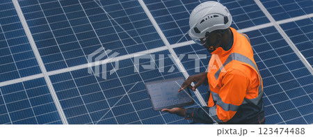 Engineer Checking solar panels in agriculture farm land. 123474488