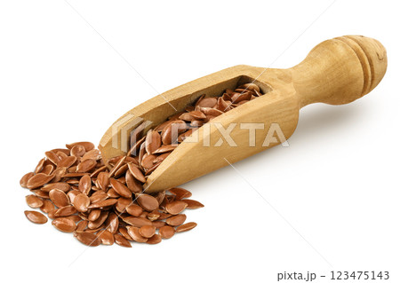 flaxseed in wooden scoop isolated on white background. 123475143