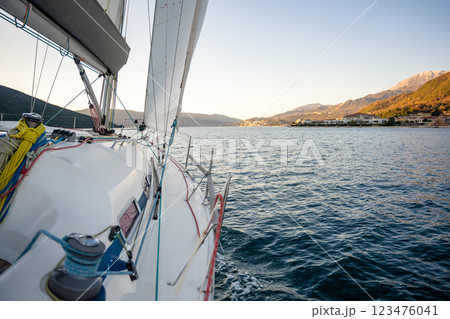 Yacht sailing in Adriatic sea. Close-up view of the deck, mast and sails. Yachting concept 123476041