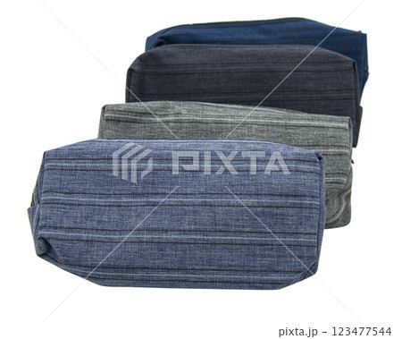 Multicolored pencil pen case container isolated on the white background Multicolored pencil pen case container isolated on the white background 123477544