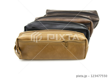 Multicolored pencil pen case container isolated on the white background Multicolored pencil pen case container isolated on the white background 123477550