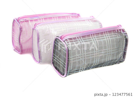 Multicolored pencil pen case container isolated on the white background 123477561