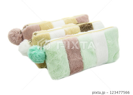 Multicolored pencil pen case container isolated on the white background Multicolored pencil pen case container isolated on the white background 123477566