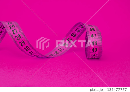 Tape measure sew diet colorful isolated on the white background Tape measure sew diet colorful isolated on the white background 123477777