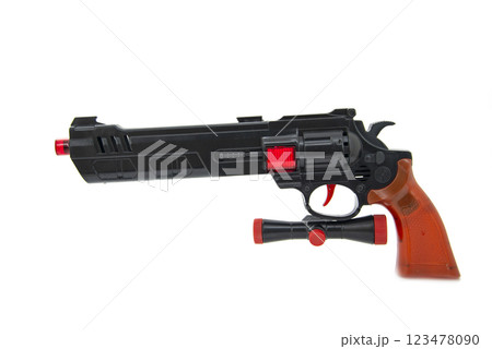 Toy gun black pistol for fun isolated on the white background 123478090
