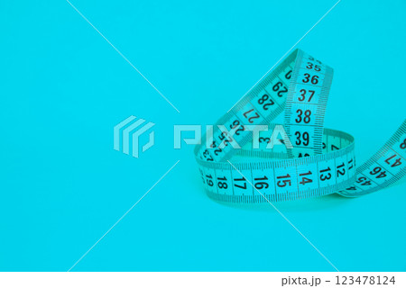 Tape measure sew diet colorful background with copyspace 123478124